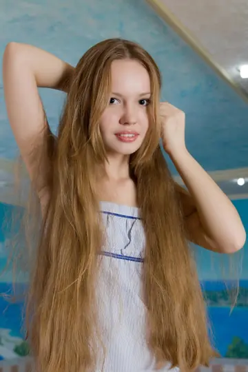 Virginia Sun – Slim Russian Redhead Undresses and Poses Nude on the Beach