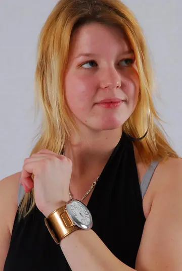 Redhead in High Heels Poses and Shows Off a Cuff Watch