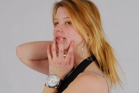 Redhead in High Heels Poses and Shows Off a Cuff Watch – photo 9 of 16