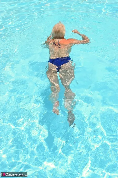 Mature Curvy Blonde Reveals Her Natural Tits by the Pool – photo 6 of 16