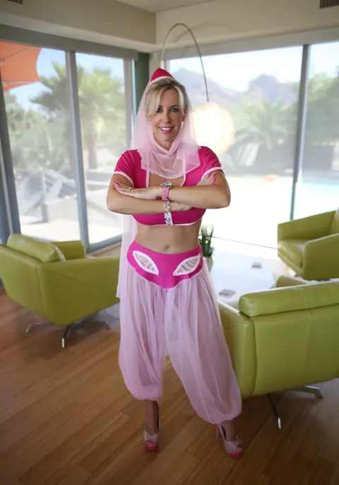 Busty Blonde MILF Releases Her Tits from Costume – photo 3 of 11