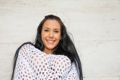 Kyra Hot: Brunette with Enhanced Tits Oils Her Breasts and Fucks Her Pussy with a Dildo – photo 2 of 16