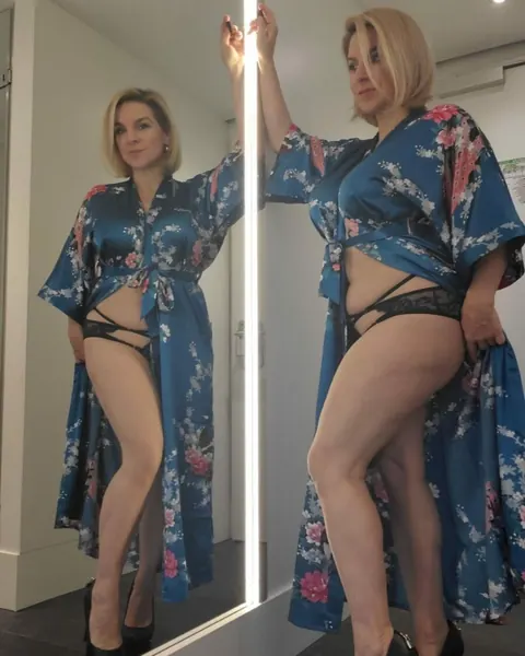 Curvy Blonde MILF Strips to Lingerie and Shows Her Big Tits – photo 8 of 20