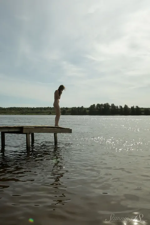 PAWG Spreads Her Shaved Pussy on a Lake Dock – photo 16 of 16