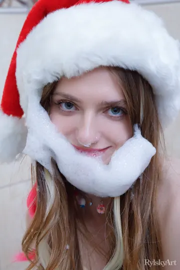 Woman Removes Santa Cap in the Bathroom