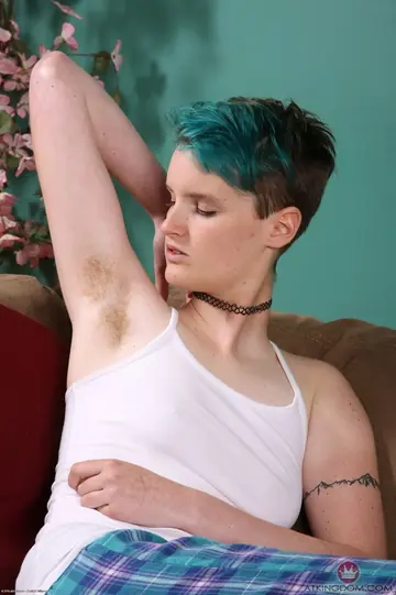 Thick Short-Haired Amateur Spreads Her Hairy Pussy on the Sofa
