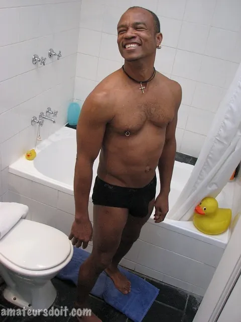Bodybuilder Strokes His Uncut Cock in the Bathroom – photo 9 of 21