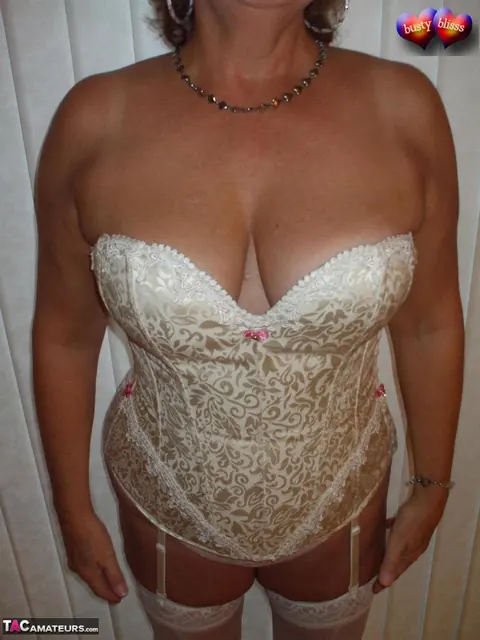 Bustybliss: Mature Busty Brunette Spreads in a Corset and Stockings – photo 13 of 20