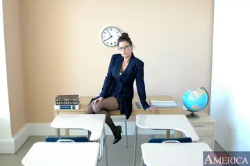 Mature Brunette in Glasses, Stockings and Heels Spreads Her Hairy Pussy