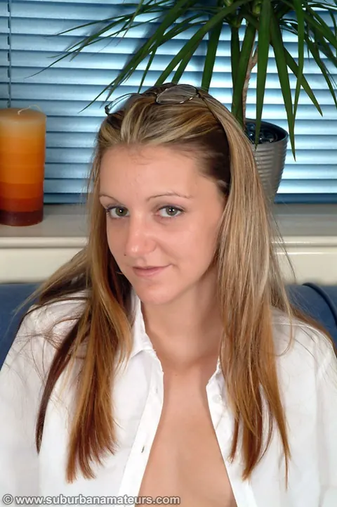 Petite British Secretary Toys Herself in Stockings on the Sofa – photo 7 of 21