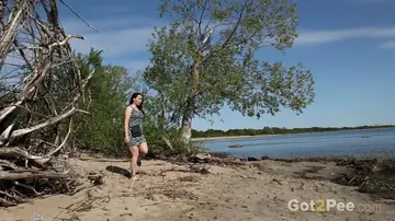 Brunette PAWG Spreads Her Legs in a Skirt on the Beach