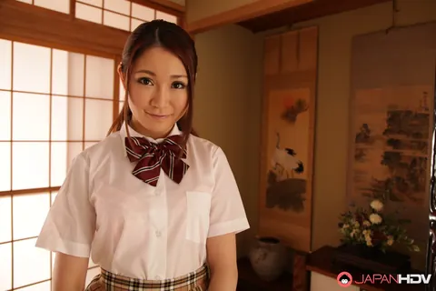 Airi Mizusawa: Japanese Brunette Poses in a Skirt Uniform with Ice Cream – photo 8 of 15