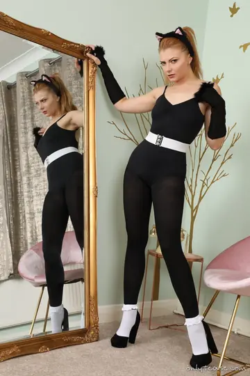 Scarlett Foxett – Pale Redhead in Pigtails Strips Out of Her Costume and Pantyhose