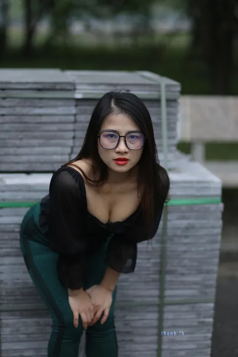 Asian Brunette with Big Tits Poses in a Top and Glasses Outdoors – photo 3 of 21