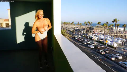 Thick Blonde MILF Flashes Her Big Tits and Spreads on the Balcony – photo 8 of 16