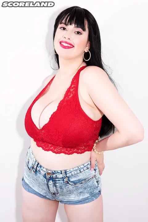 Dina Sahari: Brunette BBW in Shorts and Heels Shows Off Her Big Natural Tits – photo 1 of 16