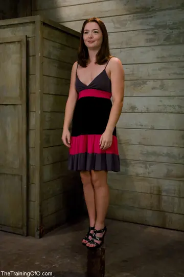 Brunette with Small Natural Tits Spreads in Bondage Dress and Heels