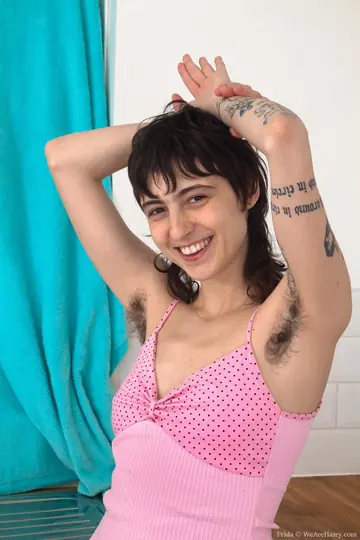 Tattooed Brunette Flaunts Hairy Armpits and Spreads Her Bush