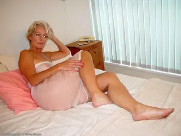 Thick Mature Woman in Lingerie Strips and Spreads Her Hairy Pussy