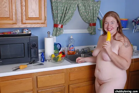 Curvy Mature Redhead Uses a Yellow Dildo on Her Pussy – photo 16 of 16