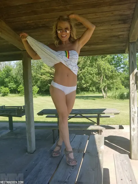 Meet Madden: Slim Blonde MILF in Glasses and Panties Sunbathes Topless Outdoors – photo 2 of 15