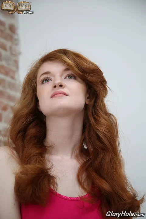 Abbey Rain: Slim Redhead Strips and Takes BBC in the Gloryhole Room – photo 5 of 16