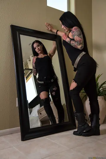 Busty Brunette in Boots Strips and Shows Her Holes