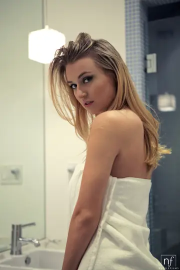 Blonde Babe with Big Natural Tits Poses and Spreads in the Shower