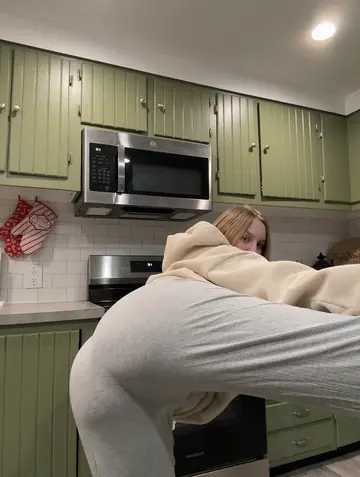 Woman Slips Out of Her Clothes to Show Her Big Natural Tits