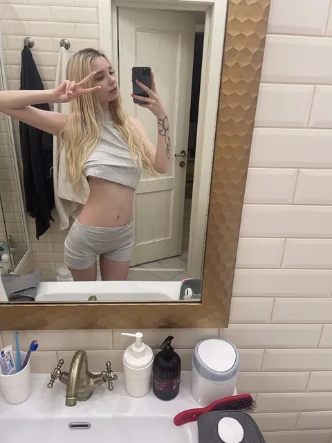 Petite Blonde with Natural Tits and Tattoos Strips Nude – photo 1 of 12