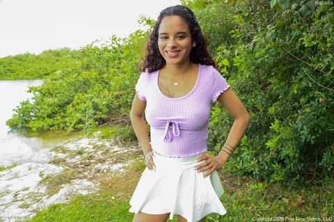 Latina in a Skirt and Sneakers Shows Her Enhanced Tits Outdoors – photo 11 of 15