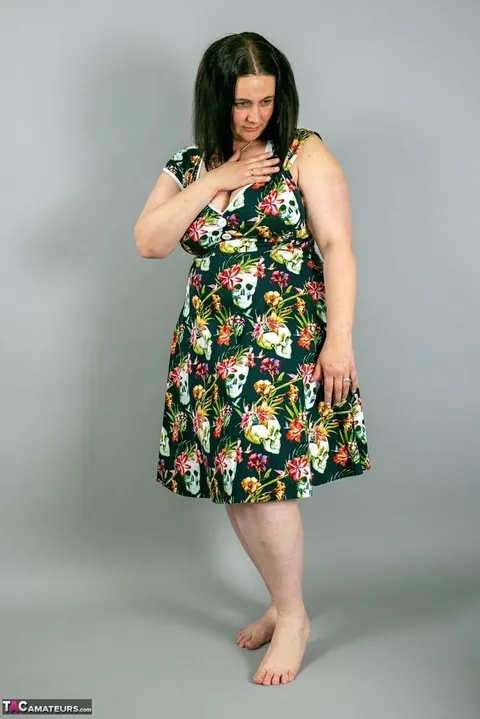 Mature Curvy Woman Strips Out of Her Skirt While Holding Umbrella – photo 12 of 16