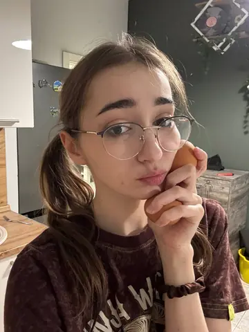 Brunette with Natural Tits and Glasses Takes a Facial Outdoors