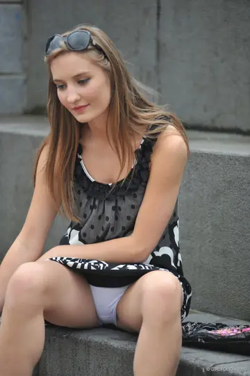 Woman Strips Out of Her Dress in Public