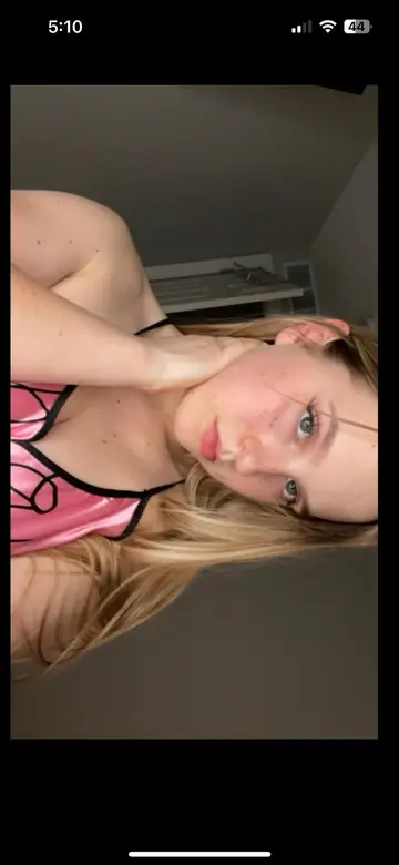 Blonde with Big Tits Undresses and Poses Fully Nude