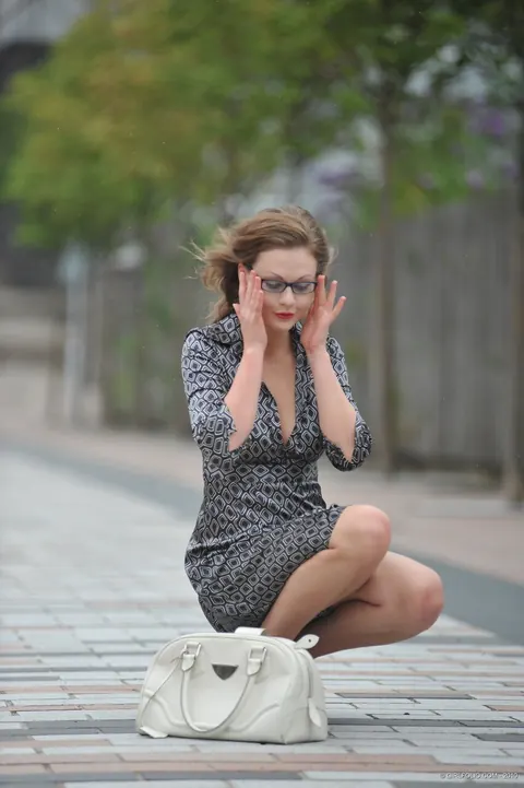 Tina Kay: Tall Brunette in Glasses Flashes Panties in Public – photo 3 of 12