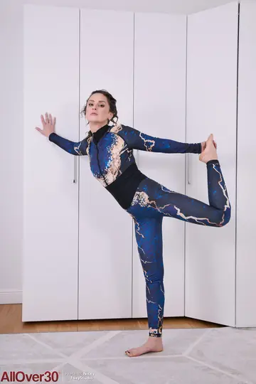 Mature Brunette Slips Out of Her Yoga Pants and Spreads Her Shaved Pussy
