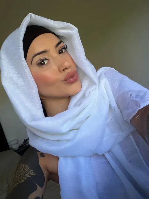 Skinny Arab Woman with Tattoos Poses Clothed – photo 12 of 12