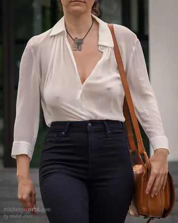 Mature Woman with Big Tits Poses Clothed in Public