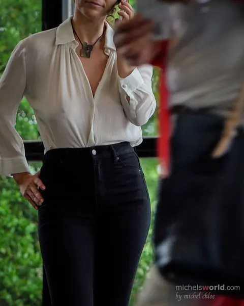 Mature Woman with Big Tits Poses Clothed in Public – photo 1 of 11