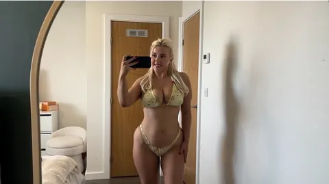 Blonde MILF Strips Nude and Bares Her Big Tits – photo 8 of 10