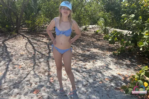 Woman in a Bikini Strips for Anal and Spreading on the Beach – photo 3 of 21