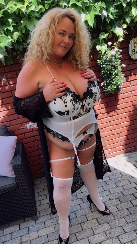 Dutch BBW Wears Lingerie and Mesh Stockings While Smoking – photo 3 of 18