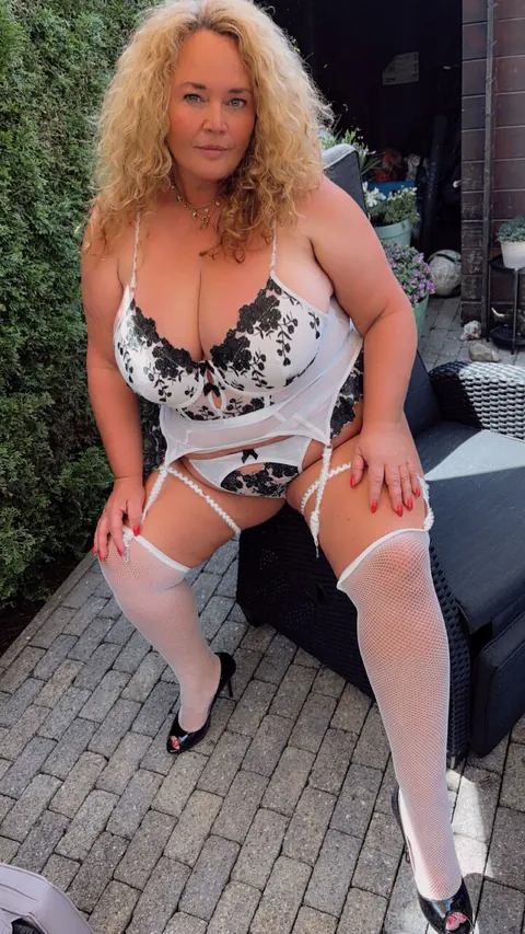 Dutch BBW Wears Lingerie and Mesh Stockings While Smoking – photo 6 of 18
