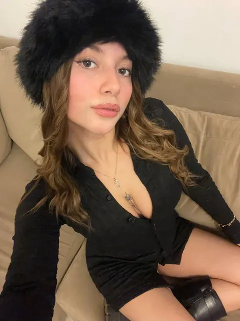 Brunette with Big Tits Poses in a Skirt for a Selfie – photo 8 of 11
