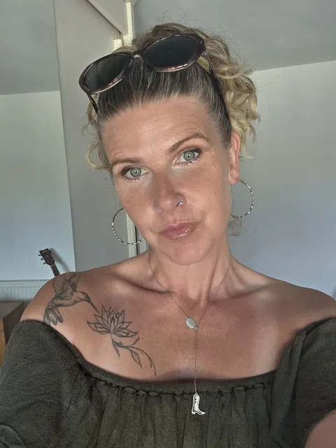 MILF with Piercing Strips and Poses Nude – photo 3 of 10