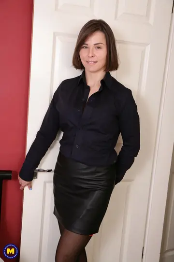 Mature British Woman Lifts Her Skirt and Fingers Her Pussy in Stockings