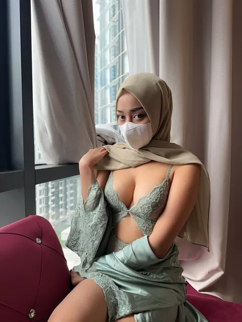 Slim Arab Woman with Enhanced Tits Poses in Lingerie – photo 9 of 13