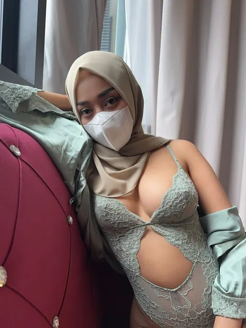 Slim Arab Woman with Enhanced Tits Poses in Lingerie – photo 3 of 13