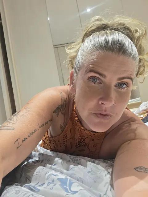 Curly Blonde MILF in a Dress Strips for Selfies – photo 5 of 10